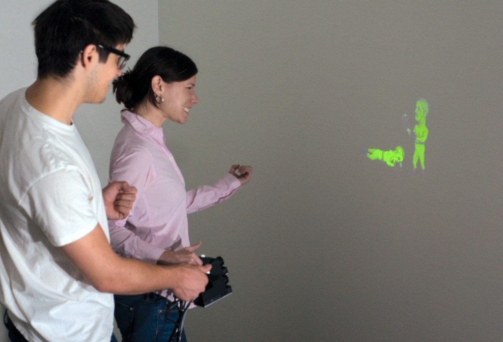 SideBySide- Ad-hoc Multi-user Interaction with Handheld Projectors-Image