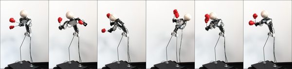 Vibration-Minimizing Motion Retargeting for Robotic Characters